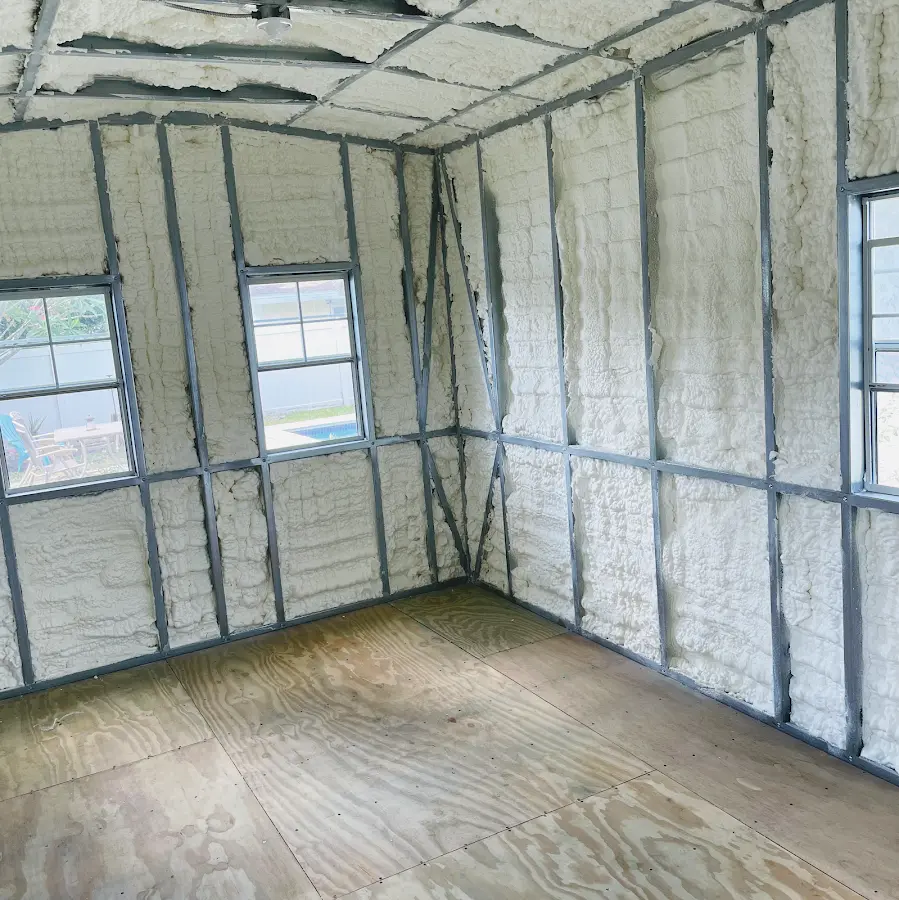 Closed-cell spray foam insulation applied to wall cavities in a residential project in Griswold